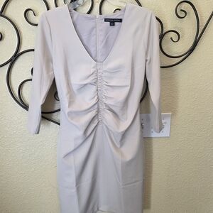 Elegant Cream Dress with Ruched Detail